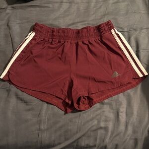 Adidas Women's Maroon Athletic Shorts with White Stripes